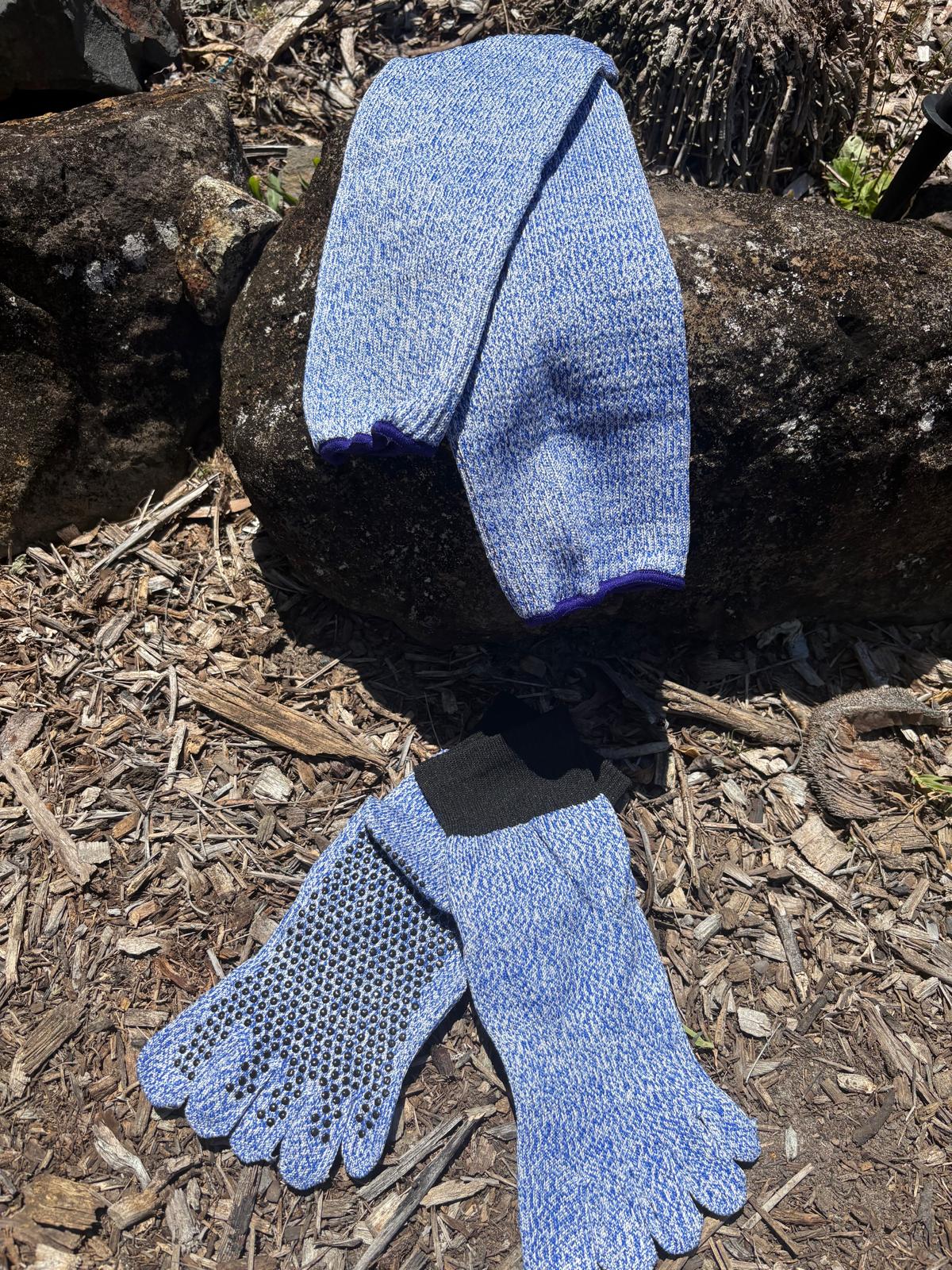 Pair of blue toe socks on a wooden surface